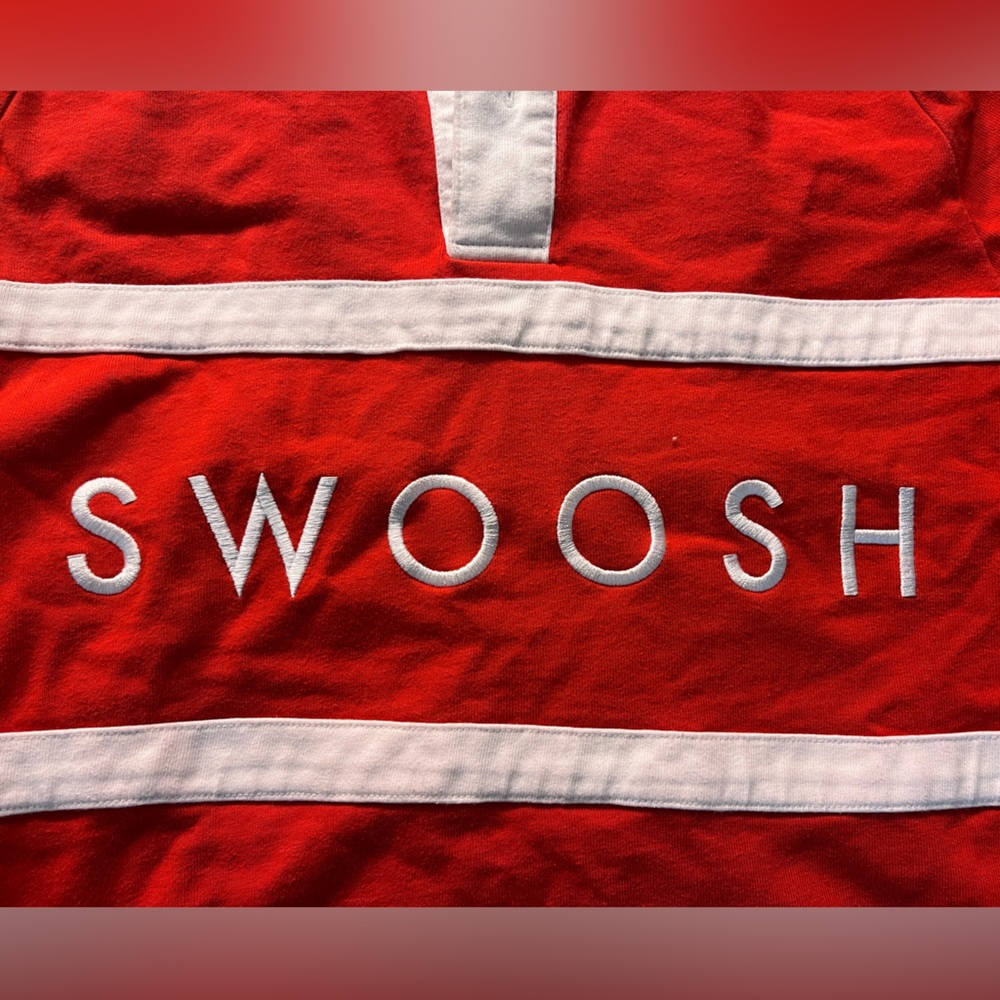 Basically new, Nike swoosh rugby style shirt